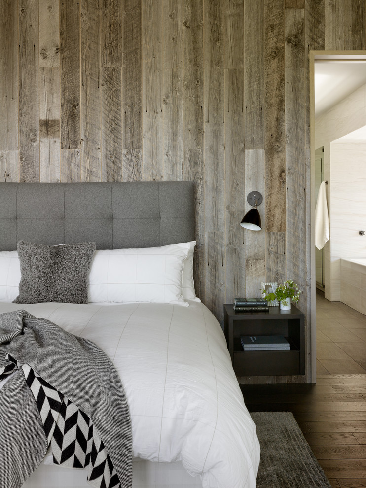 Inspiration for a country bedroom in Other with dark hardwood floors.