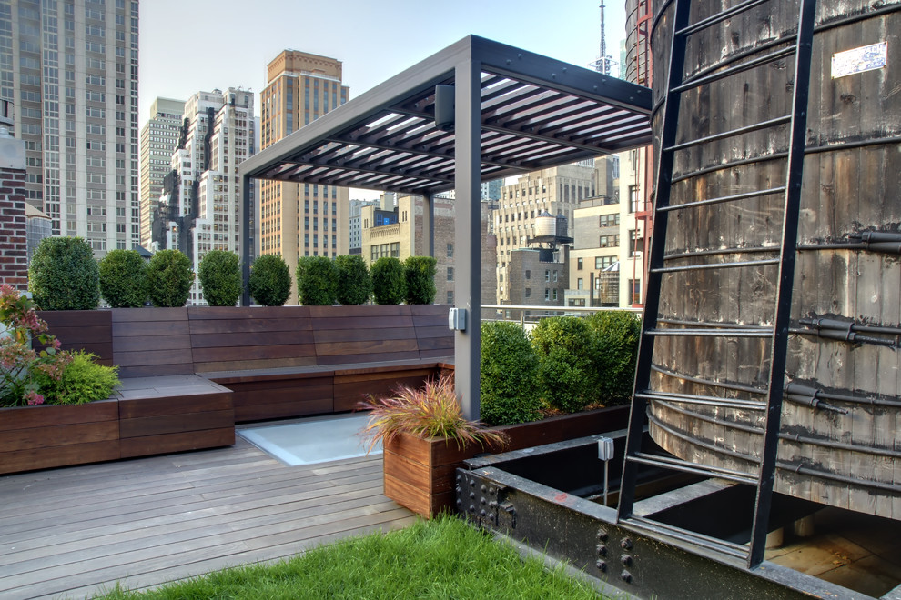 Contemporary rooftop and rooftop deck in Boston with a pergola.