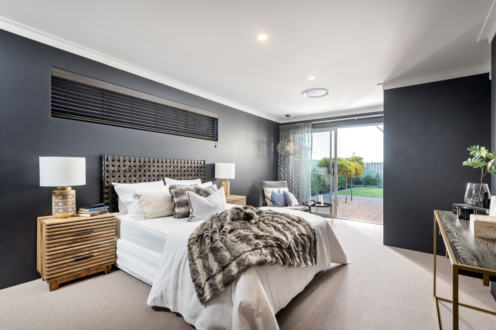 Inspiration for a beach style master bedroom in Perth with black walls, carpet and beige floor.