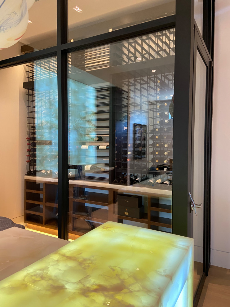 Design ideas for a mid-sized contemporary wine cellar in Los Angeles with storage racks.