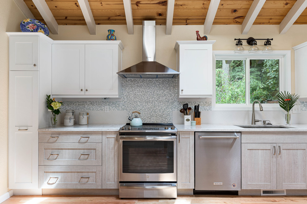 Example of a transitional kitchen design in Seattle