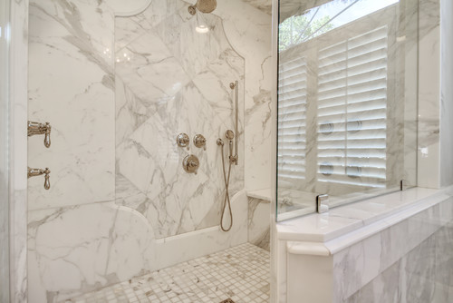 Traditional master bath with Calacatta marble