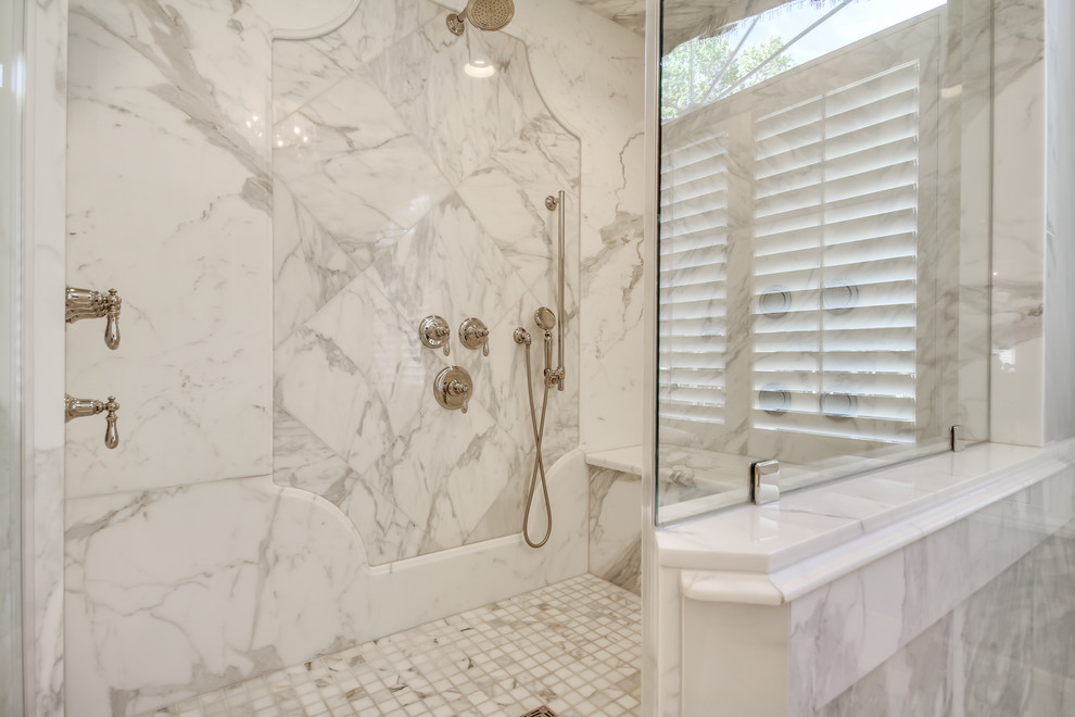 Design ideas for a large traditional master bathroom in Philadelphia with an undermount sink, recessed-panel cabinets, white cabinets, marble benchtops, a claw-foot tub, a corner shower, white tile, stone tile, grey walls and marble floors.