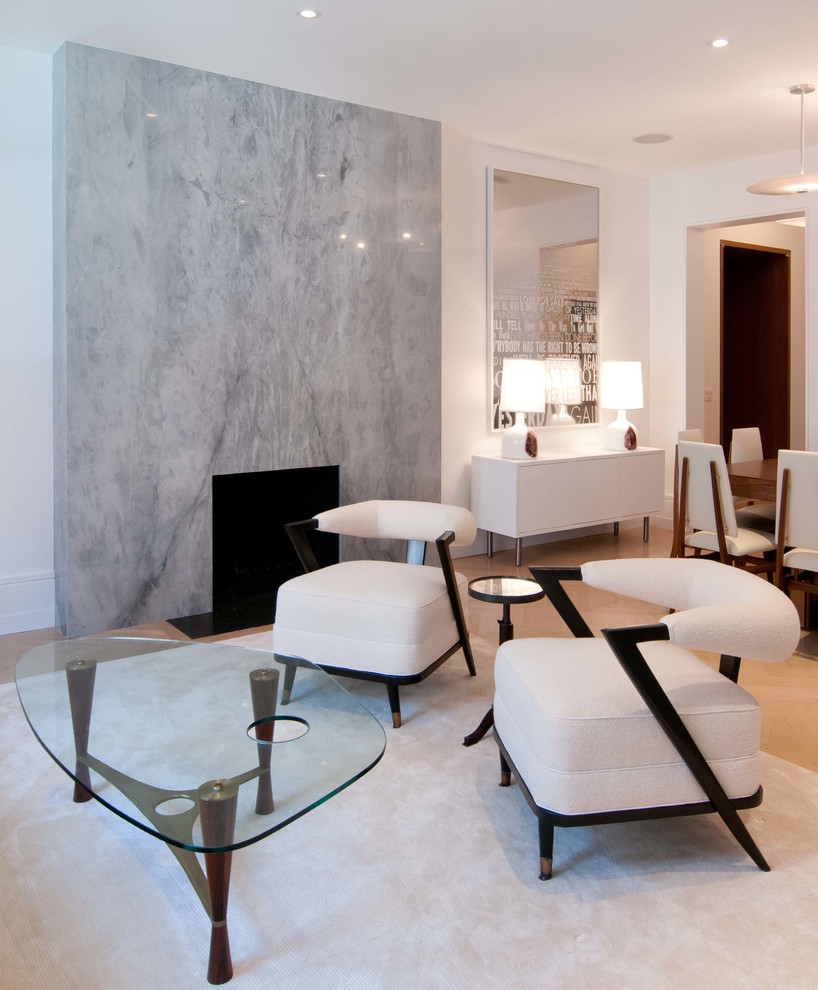 Living room - contemporary formal light wood floor and beige floor living room idea in New York with white walls, a standard fireplace and a stone fireplace