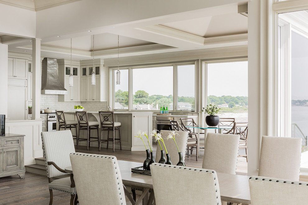 Inspiration for a beach style kitchen/dining combo in Boston with dark hardwood floors.