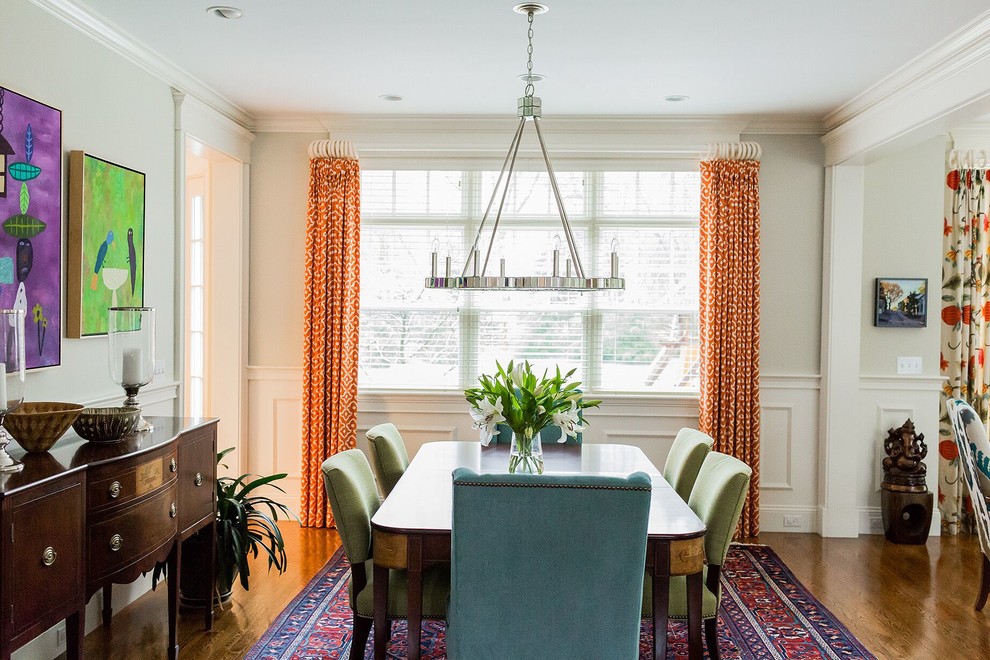 Photo of a large traditional dining room in Boston with beige walls, medium hardwood floors and no fireplace.