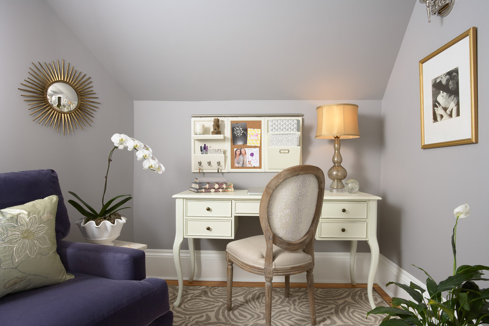 Design ideas for a mid-sized traditional home office in Minneapolis with grey walls, medium hardwood floors, a freestanding desk, no fireplace and grey floor.