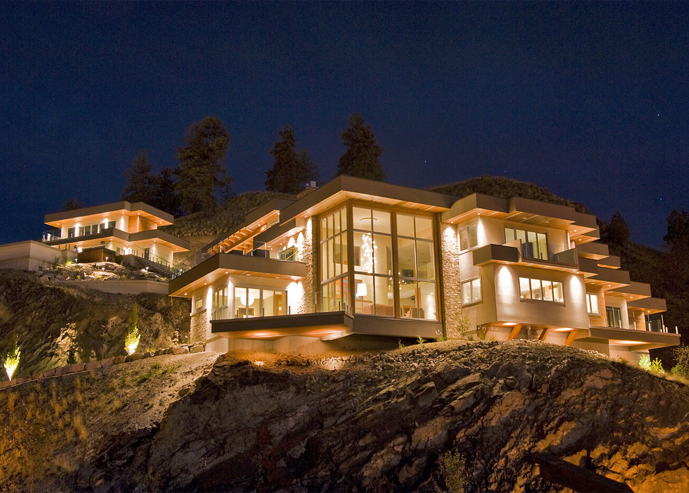 Design ideas for an expansive contemporary two-storey exterior in Vancouver.