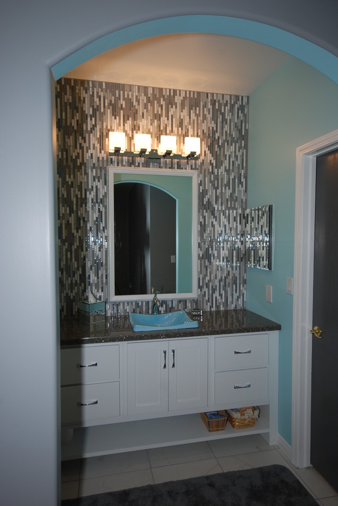 This is an example of a small contemporary bathroom in Other with a drop-in sink, shaker cabinets and a two-piece toilet.