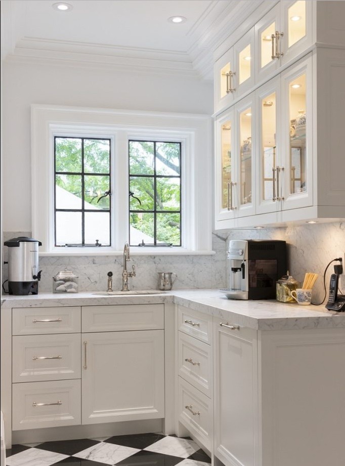 Example of a transitional kitchen design in Toronto