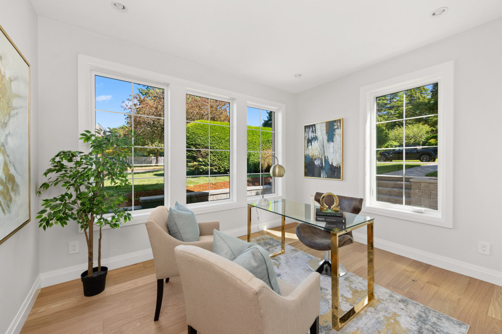 Example of a transitional home design design in Vancouver