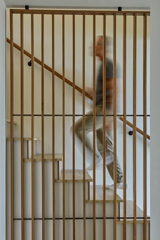 Glasswing Modern Staircase Seattle by McClellan Tellone