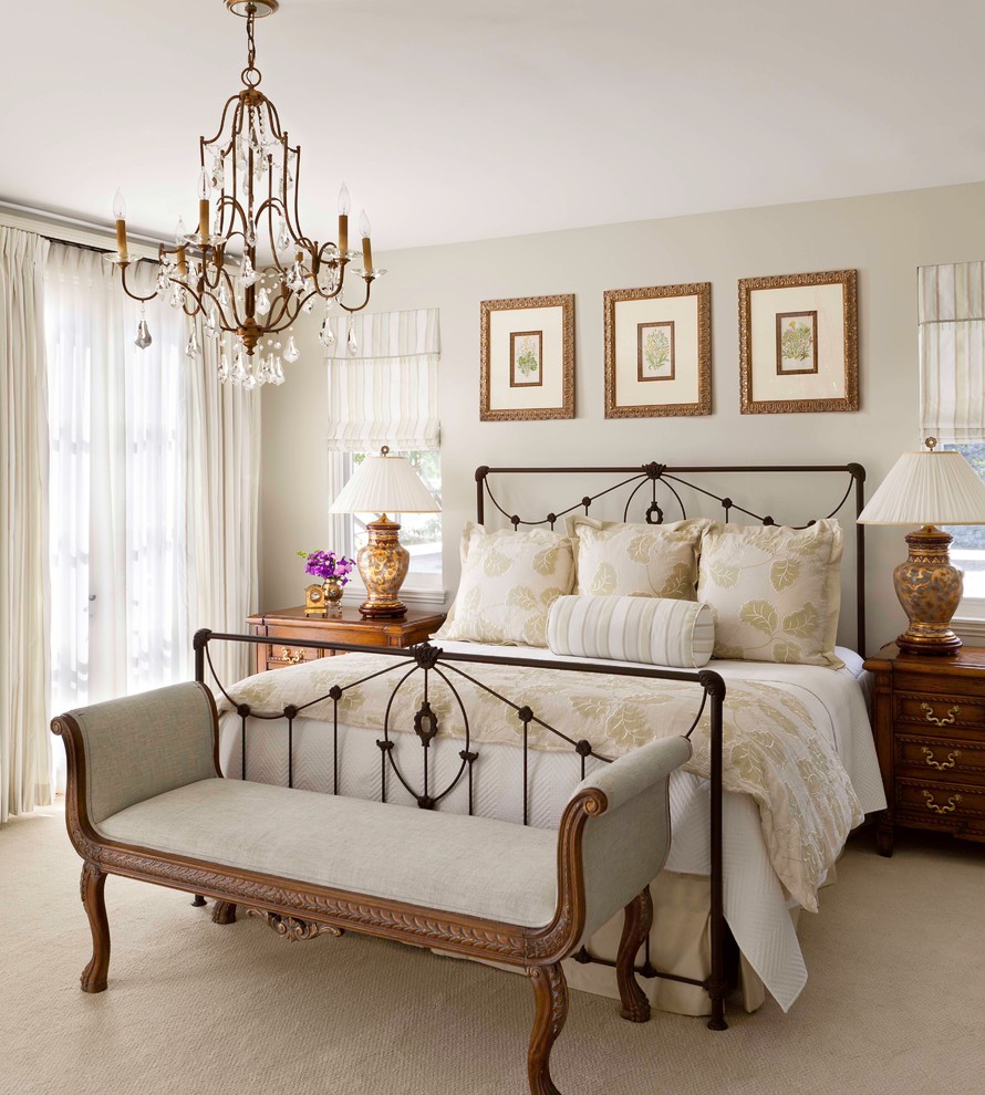 Inspiration for a timeless master carpeted bedroom remodel in Denver with beige walls