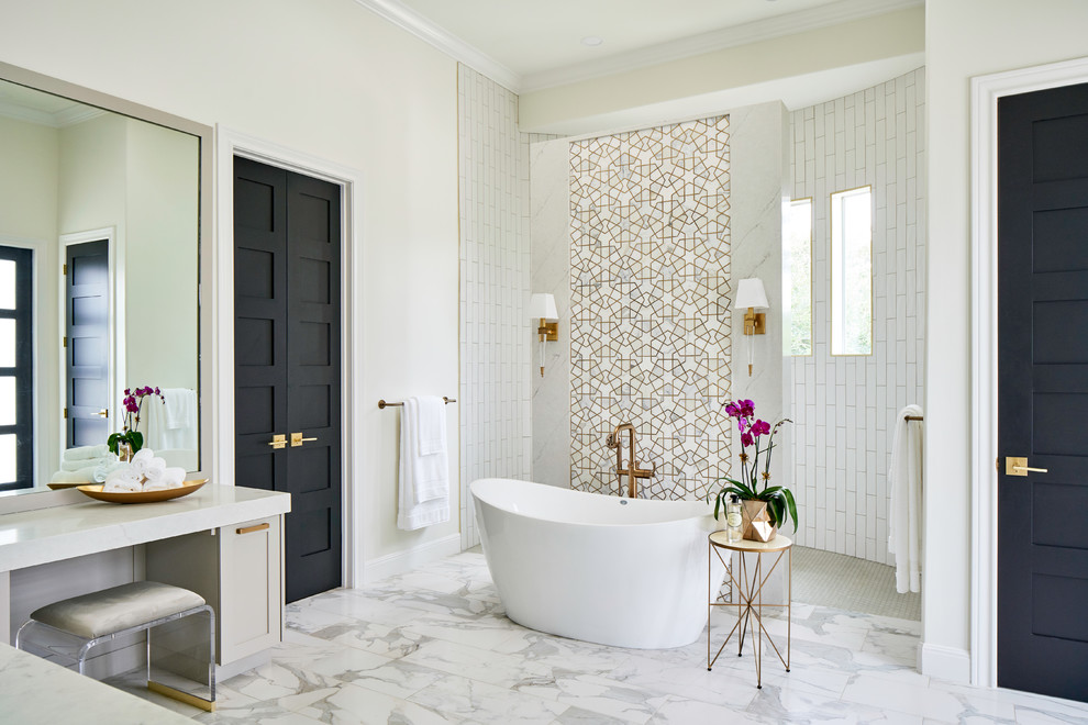 Large transitional master bathroom in Austin with shaker cabinets, grey cabinets, a freestanding tub, an open shower, a one-piece toilet, white tile, mosaic tile, white walls, porcelain floors, an undermount sink, engineered quartz benchtops, white floor, an open shower and grey benchtops.