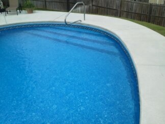Example of a mid-sized backyard kidney-shaped indoor pool design