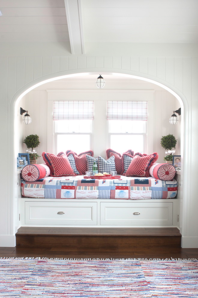 Kids' study room - study space and mid-sized coastal gender-neutral dark wood floor and brown floor kids' study room idea in San Diego with white walls