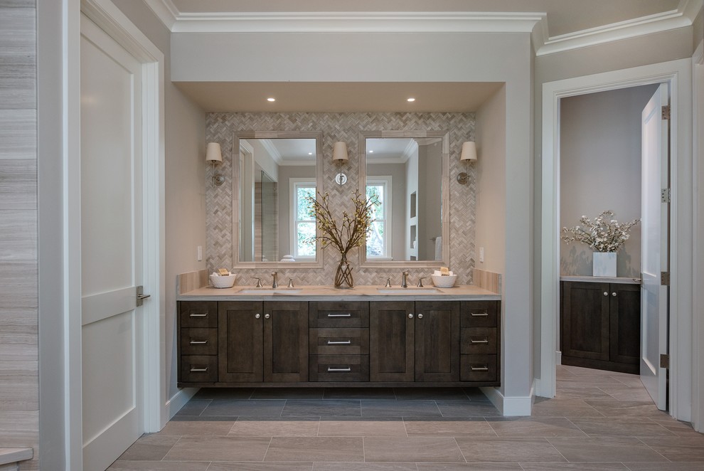 This is an example of a large country master bathroom in San Francisco with shaker cabinets, dark wood cabinets, an undermount tub, a curbless shower, a one-piece toilet, gray tile, ceramic tile, grey walls, porcelain floors, an undermount sink, engineered quartz benchtops, grey floor and an open shower.