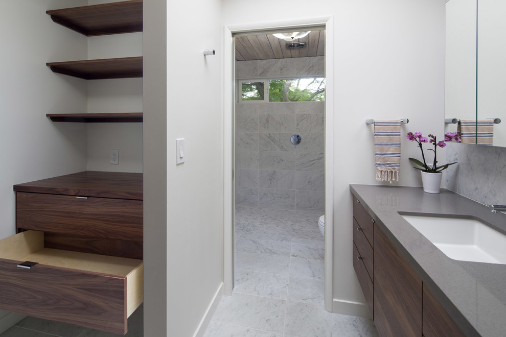 This is an example of a small midcentury bathroom in Portland with flat-panel cabinets, medium wood cabinets, marble floors and multi-coloured floor.