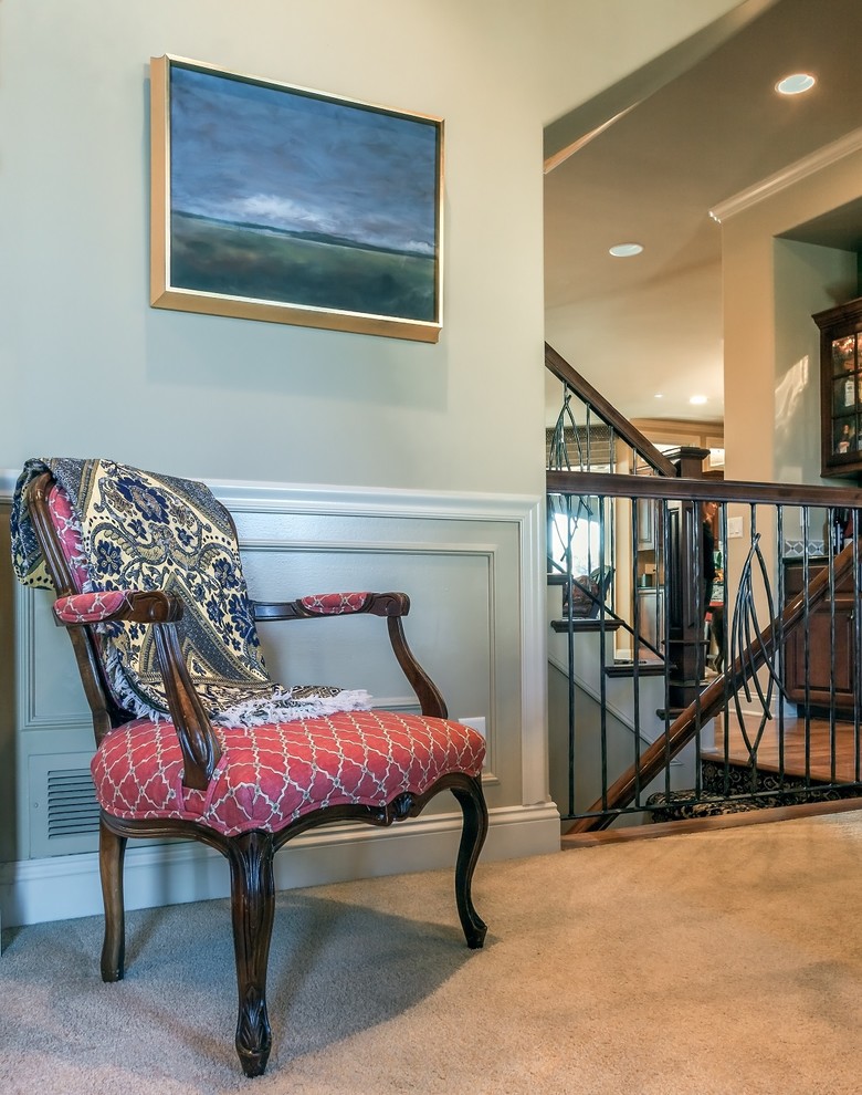 Example of a transitional dining room design in Omaha