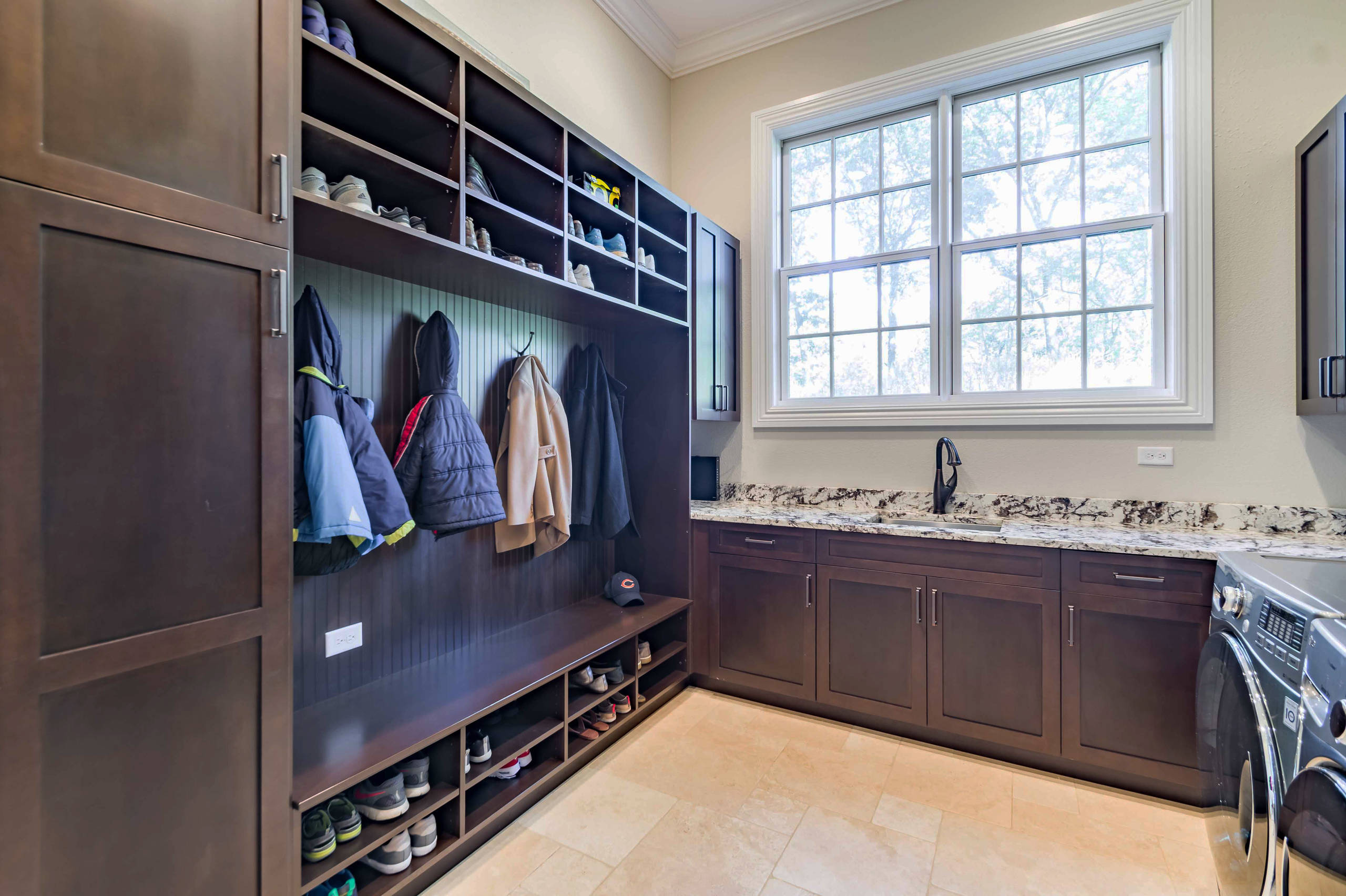 This 6,000sf luxurious custom new construction 5-bedroom, 4-bath home combines elements of open-concept design with traditional, formal spaces, as well.  Tall windows, large openings to the back yard,