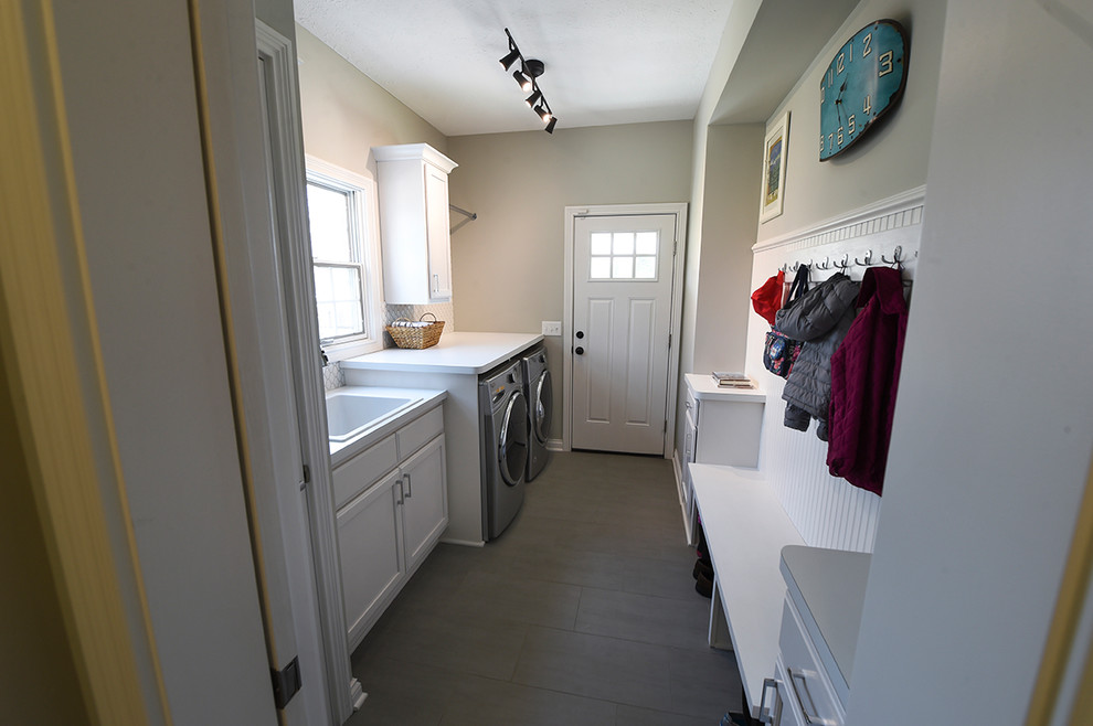 Transitional laundry room in Cleveland.
