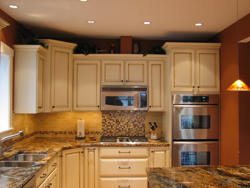 are the cabinets refurbished with just crown molding on top and front?