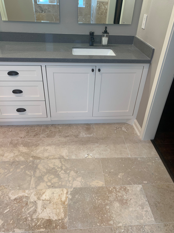 Inspiration for a large contemporary master ceramic tile, multicolored floor and double-sink bathroom remodel in Houston with gray walls, granite countertops and a built-in vanity
