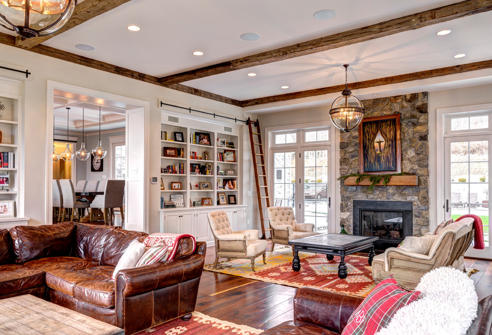 Inspiration for a traditional living room in Other with white walls and medium hardwood floors.