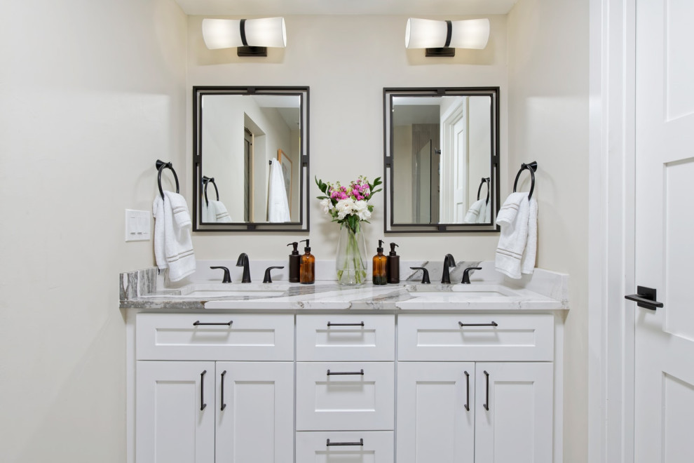 Mid-sized transitional bathroom in Santa Barbara with a drop-in tub and an open shower.