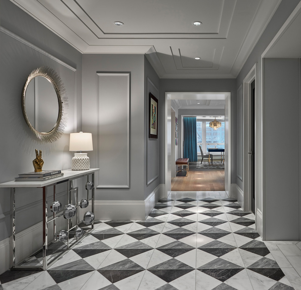 Design ideas for a transitional foyer in Chicago with grey walls.