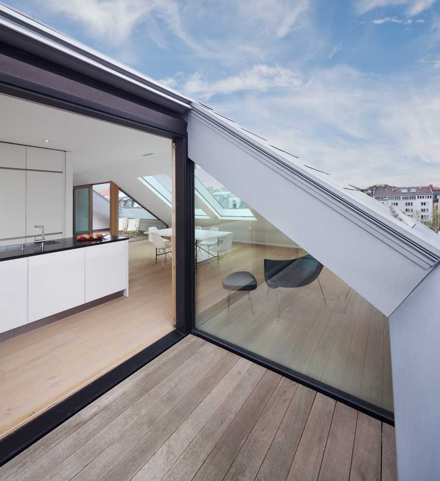 Mid-sized modern balcony in Munich with no cover.