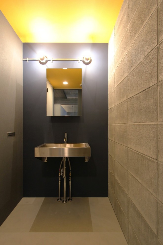 This is an example of an industrial powder room in Tokyo.