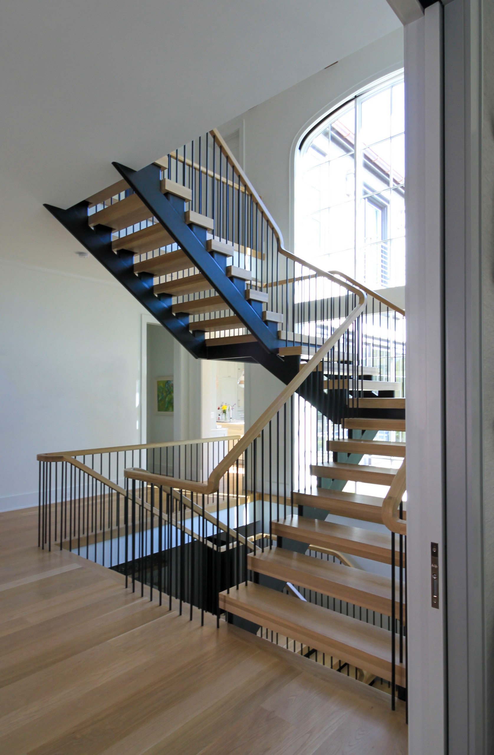 96_Dramatic cantilevered no-riser staircase, Bethesda, MD 20814