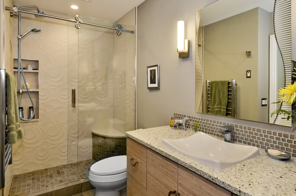 This is an example of a mid-sized transitional kids bathroom in Other with flat-panel cabinets, medium wood cabinets, an alcove shower, a one-piece toilet, beige tile, porcelain tile, porcelain floors, a freestanding tub, green walls, an integrated sink and concrete benchtops.