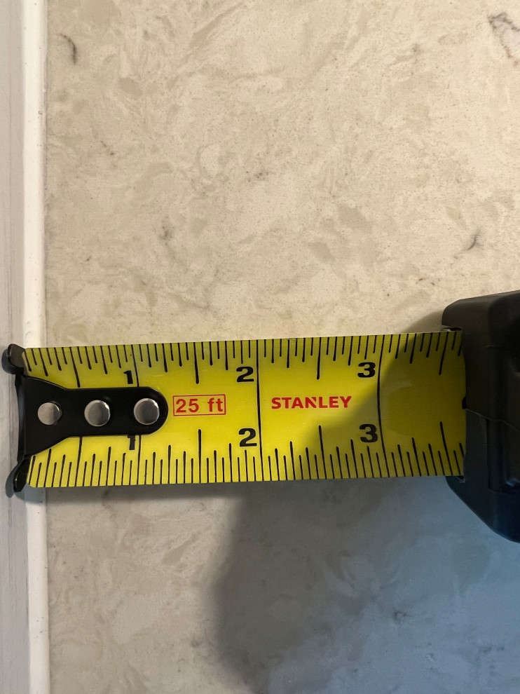 Gap between quartz countertop and wall