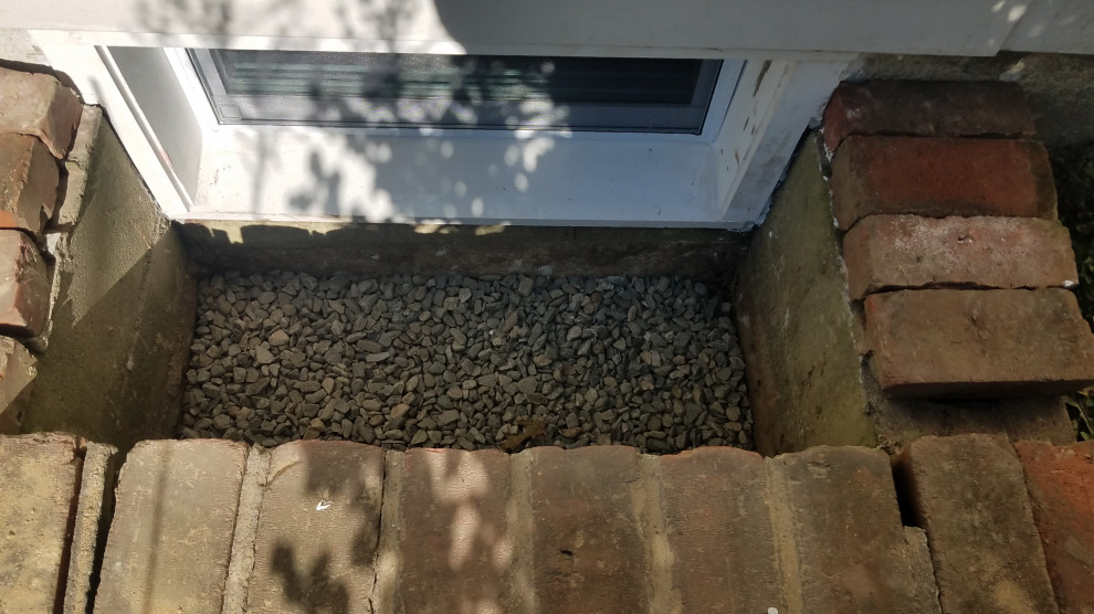 Replace Basement Window & made custom pvc trim.casing for exterior. Dug out impa