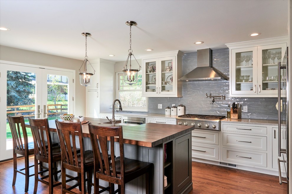 Example of a transitional kitchen design in Denver