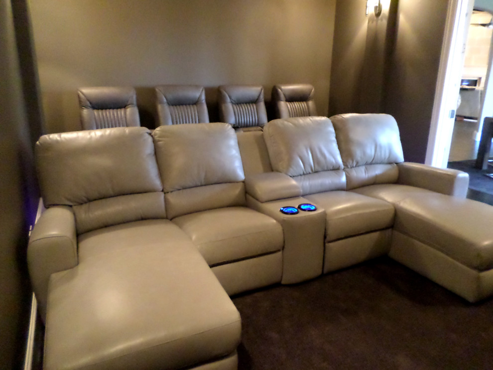 This is an example of a transitional home theatre in Dallas.