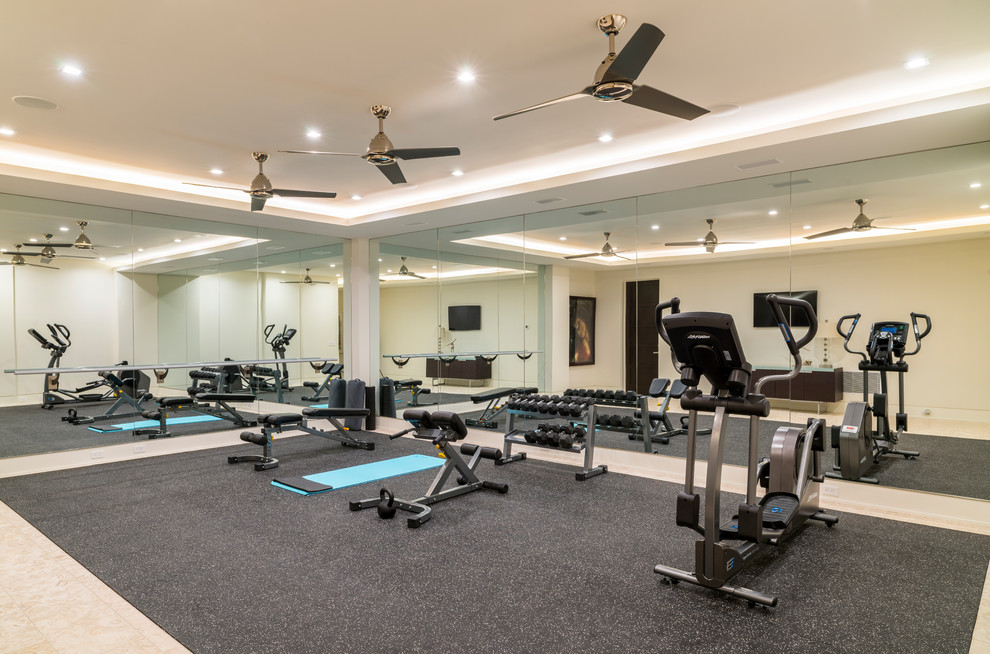 Photo of a contemporary home gym in New York.