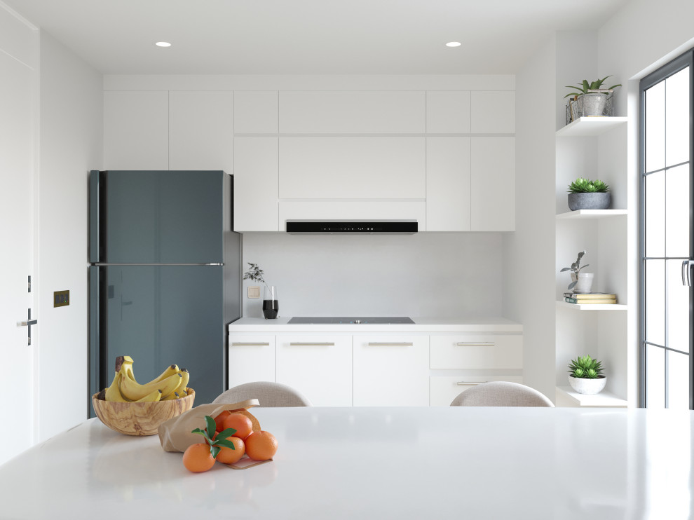 Immagine di una cucina minimalista di medie dimensioni con ante lisce, ante bianche, top in quarzo composito, paraspruzzi bianco, paraspruzzi in quarzo composito, elettrodomestici colorati e top bianco