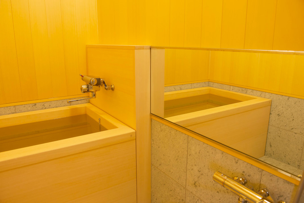 Ispirazione per una stanza da bagno etnica con vasca giapponese
