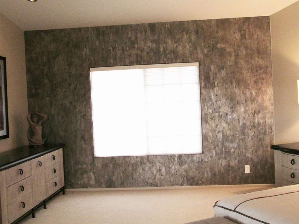 This is an example of a contemporary master bedroom in San Diego.