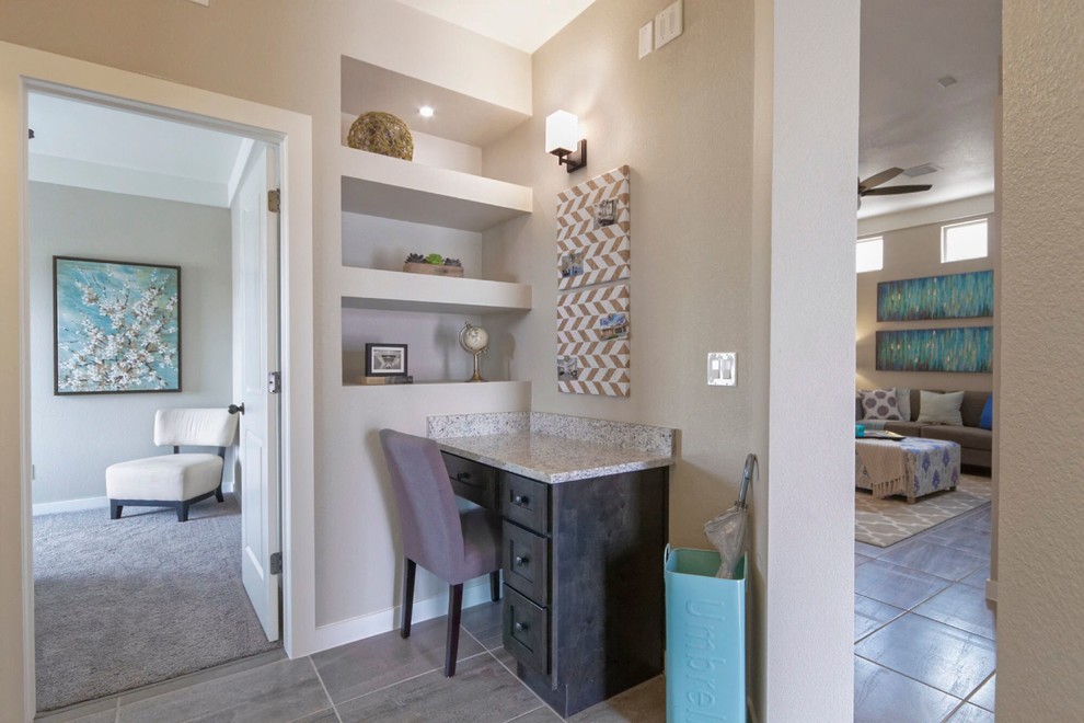 Home design - small transitional built-in desk ceramic tile home design idea in Austin with gray walls