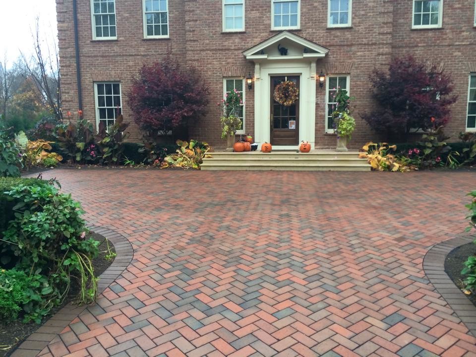 Small brick floor single front door photo in Columbus