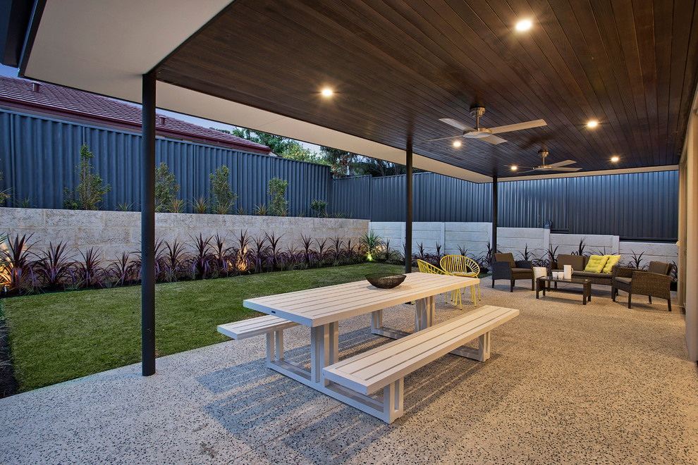 Contemporary backyard patio in Perth with a pergola.