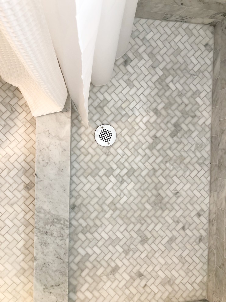Small transitional master gray tile and marble tile marble floor and gray floor alcove shower photo in Providence with furniture-like cabinets, white cabinets, white walls, an undermount sink, marble countertops and white countertops