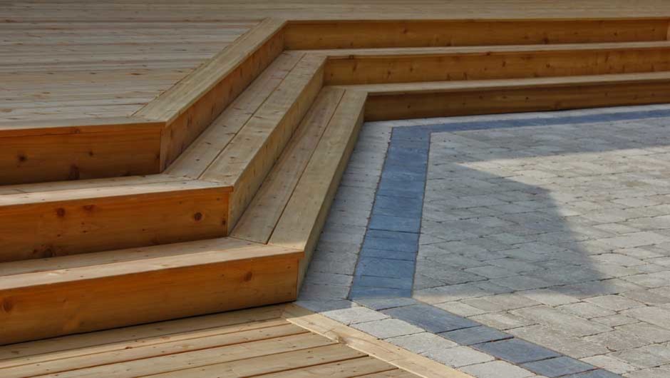 Large mountain style backyard deck photo in Toronto with no cover