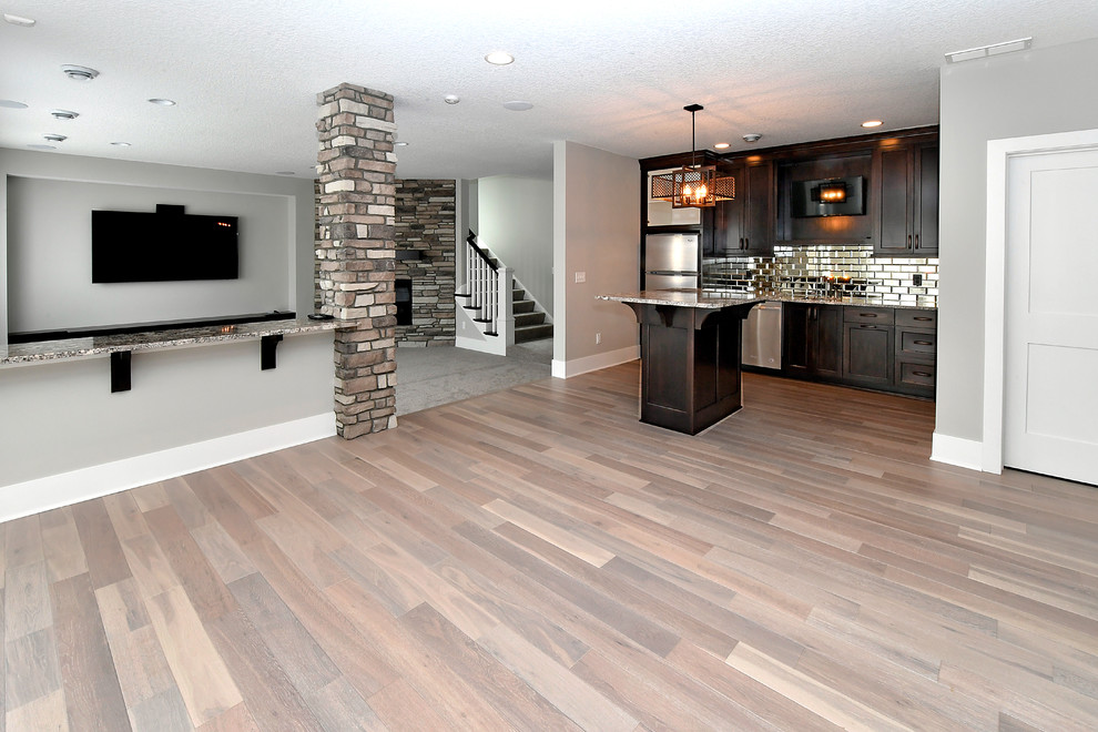 Example of a transitional home design design in Minneapolis