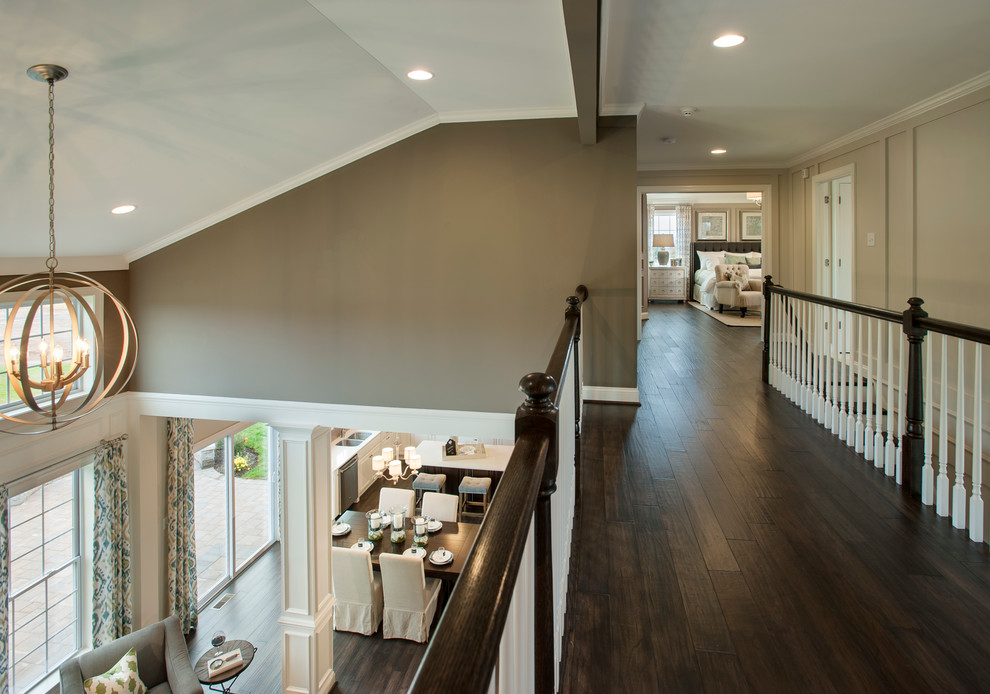 Inspiration for a mid-sized transitional hallway in Philadelphia with beige walls and dark hardwood floors.