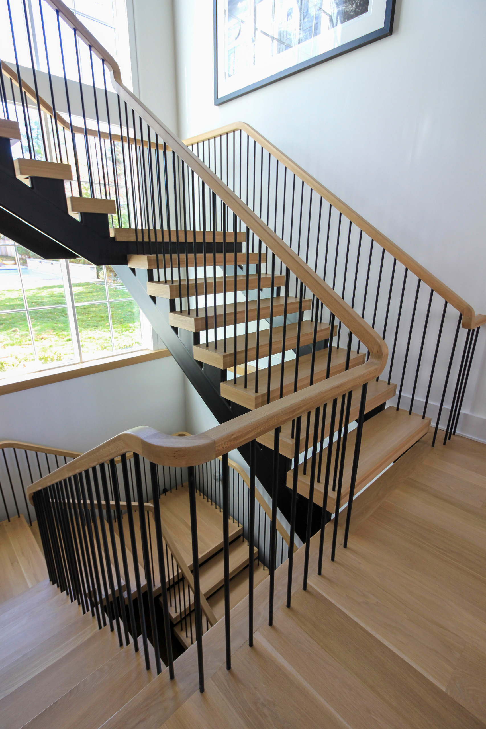 96_Dramatic cantilevered no-riser staircase, Bethesda, MD 20814
